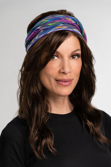 Lady with hair loss wearing her Reversible Softie Headscarf by Jon Renau in various colours